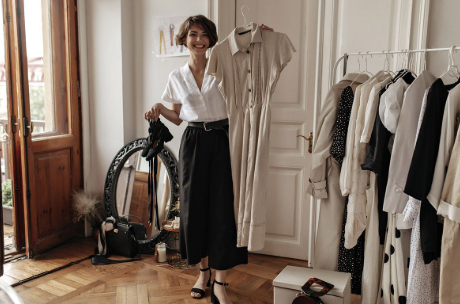 Elegant minimalist clothing on display in a boutique.