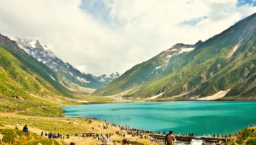 Scenic views of Kaghan Valley, featuring lush green meadows, crystal-clear rivers, and snow-capped mountains.