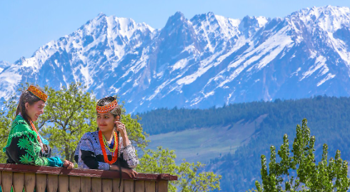 Kalash Valley: Traditional wooden houses, colorful attire, and stunning mountain landscapes of the Kalash people.