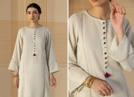 "Model wearing white organic cotton kurta with ethical accessories