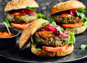  Pakistani bun kebab with egg, meat patty, and chutney