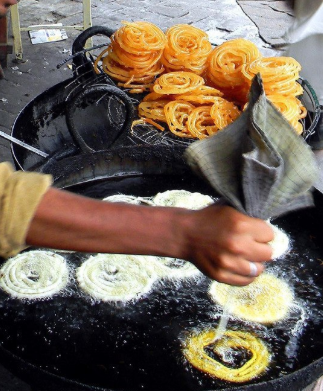  Freshly fried jalebi sweets in syrup