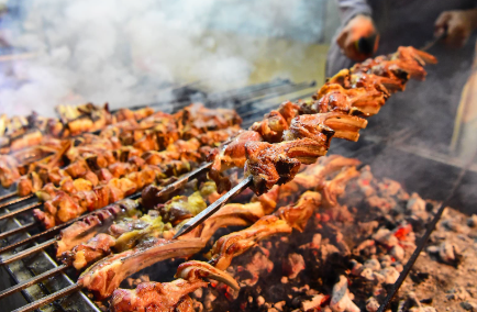 Assorted Pakistani BBQ including chicken tikka and beef boti