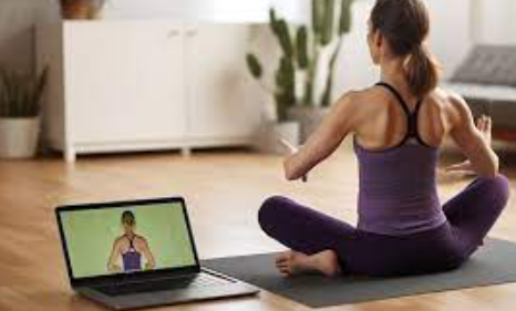 Pakistani wellness influencer livestreaming a yoga session on social media